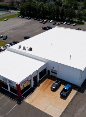 an aerial view of a used car dealership